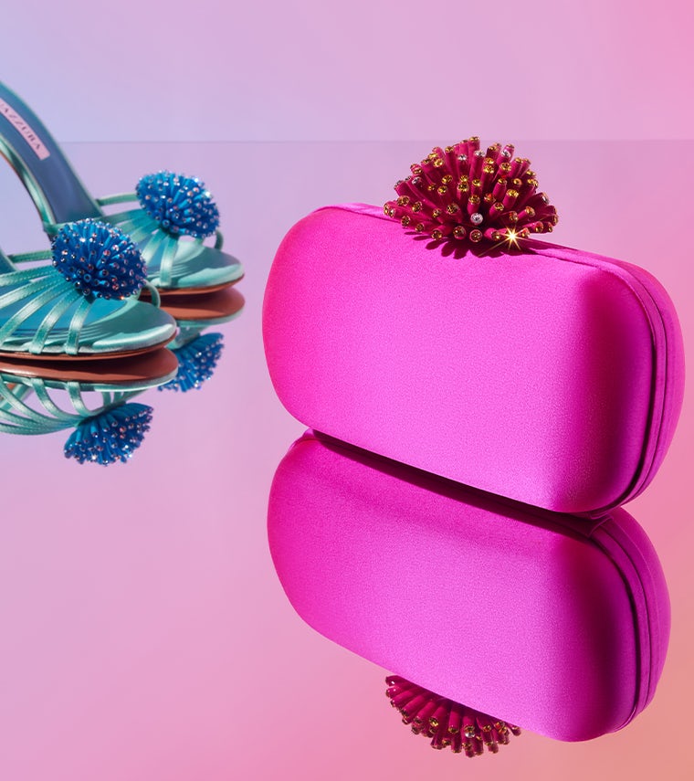 Also available in vivid orchid pink, our Anemone clutch is the statement bag of the season.